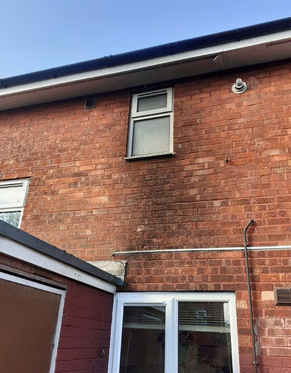 External house fire damage Before